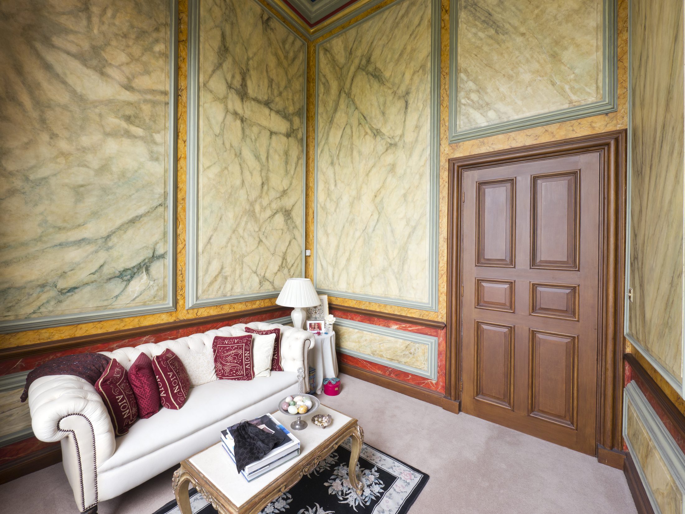 The marble-panelled Marble Room, with hand-painted chinoiserie wallpaper