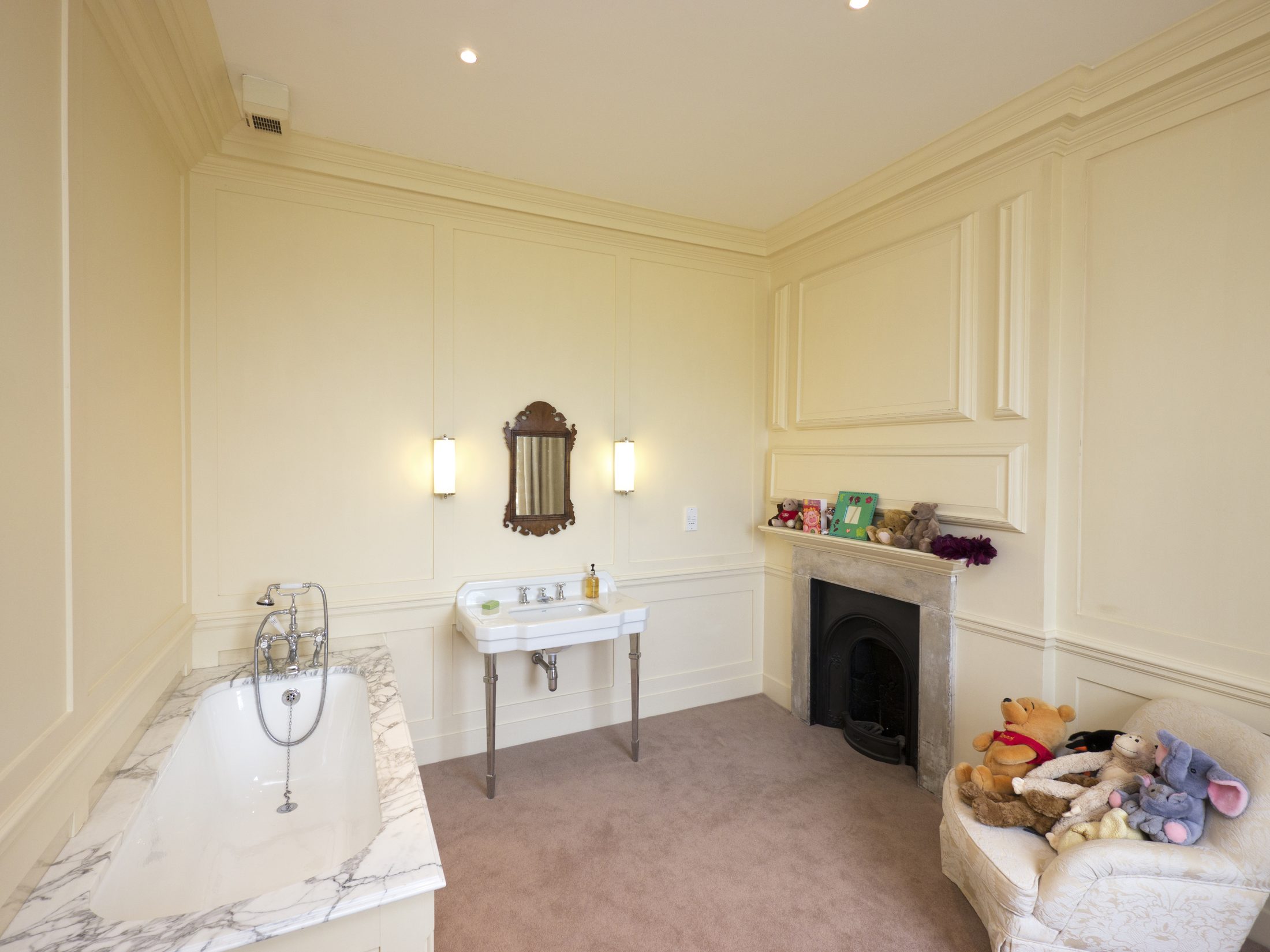 Bathroom 4, with a roll-top bath and dressing table