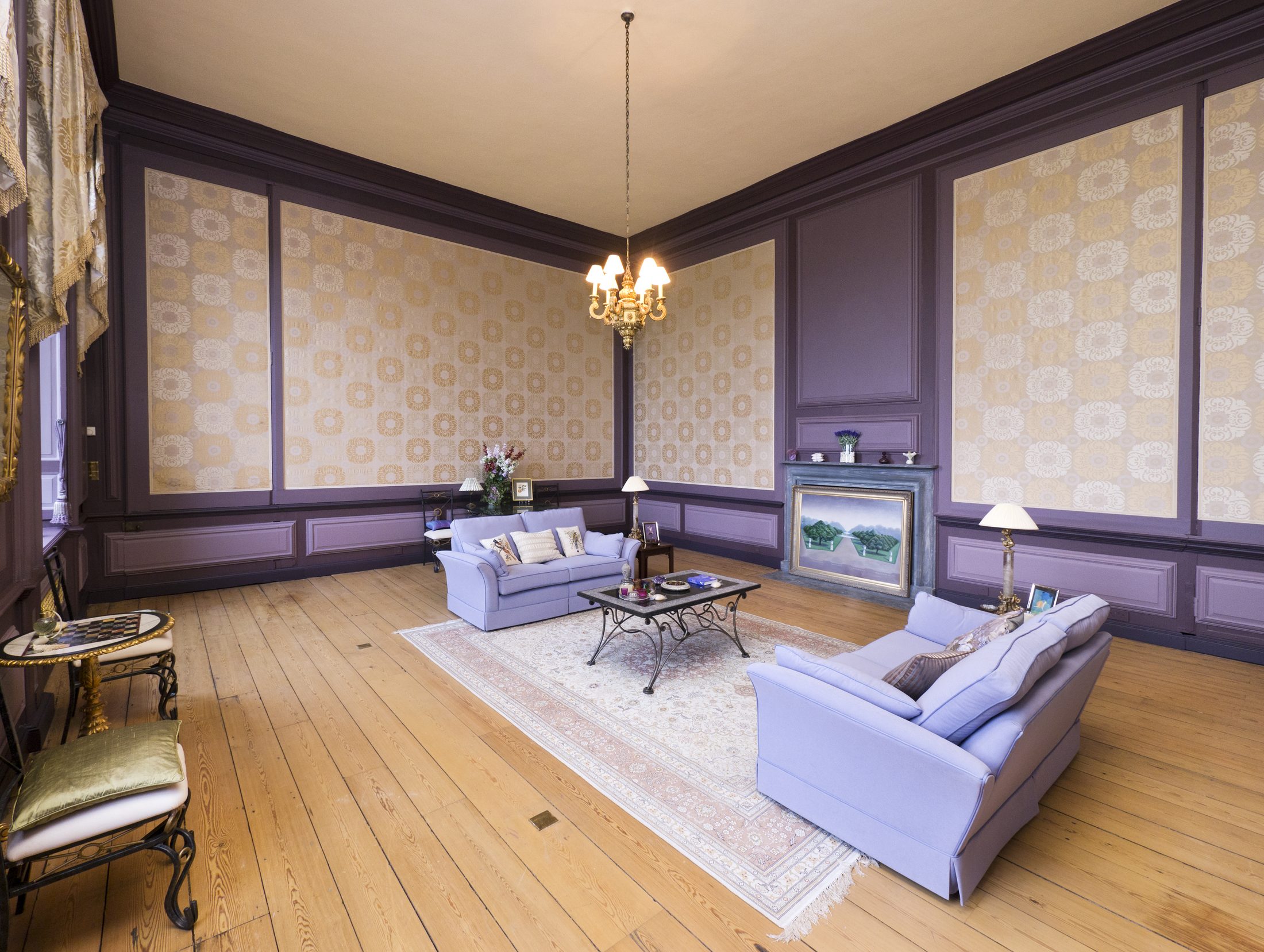 The Purple Sitting Room, south-facing, with a grey marble fireplace